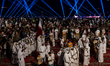 A Qatari traditional band performs during the celebration of the second day of the Eid al-...