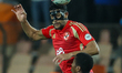 Yahya Attiat Allah of Al Ahly battles for possession with Ahmed Salem M'Bareck of Al Hilal...