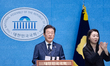 Lee Jae-myung, former leader of the Democratic Party, holds a press conference to announce...