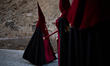 Penitents take part in the Hermandad de los Favores (Brotherhood of the Favors) procession...