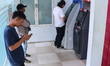 Some residents use ATM services of BCA banks at an ATM machine in Malang, East Java, Indon...