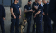 Policemen with a police dog participate in the March of the Living at Auschwitz in Oswieci...