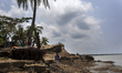 People walks in Bhola, Bangladesh, on May 24, 2016 after the Cyclone Roanu. Cyclone Roanu...