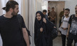 Iranian youths attend the Tehran Blood Transfusion Center to donate blood for the victims...