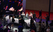 Visitors are at the Audi booth in the National Exhibition Center in Shanghai, China, on Ap...