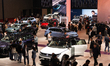 A crowd of visitors is seen at the SAIC Volkswagen booth in the National Exhibition Center...