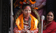 Nihira Bajracharya, the Kumari of Patan or the living goddess, watches the chariot process...