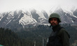 An Indian soldier of the BSF stands alert in Gulmarg, Jammu and Kashmir, India, on May 3,...