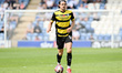 MJ Williams (14 Barrow) goes forward during the Sky Bet League 2 match between Colchester...