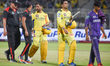 Chennai Super Kings' captain Mahendra Singh Dhoni, center, and batting partner Anshul Kamb...