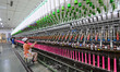 A worker works in a workshop of a textile products manufacturing enterprise in Qingzhou Ec...