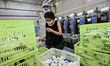 A worker works in a workshop of a textile products manufacturing enterprise in Qingzhou Ec...