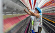 A worker works in a workshop of a textile products manufacturing enterprise in Qingzhou Ec...