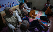 Patients receive massage therapy at a disability posyandu in Polehan Village, Malang, East...