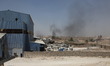 A cement factory is hit by rockets during battles between iraqi army and Islamic States mi...