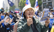 Thousands of supporters of Democratic Party presidential candidate Lee Jae-myung chant slo...