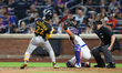 Pittsburgh Pirates' Andrew McCutchen #22 is brushed back by a pitch during the seventh inn...
