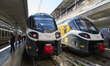 A train operated by Ferrovie Appulo Lucane (FAL) stands at the platform of the Bari railwa...