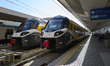 A train operated by Ferrovie Appulo Lucane (FAL) stands at the platform of the Bari railwa...