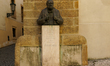 A bust of Winston Churchill with an engraved Czech-language tribute is on the outer wall n...
