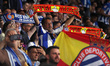 Espanyol supporters attend the match between RCD Espanyol and FC Barcelona, corresponding...