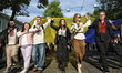 Members of the Lehit folk band and Robymo Vam Nervy NGO wear traditional Ukrainian embroid...