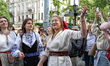 Members of the Lehit folk band and Robymo Vam Nervy NGO wear traditional Ukrainian embroid...