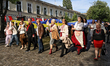 Members of the Lehit folk band and Robymo Vam Nervy NGO wear traditional Ukrainian embroid...