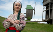 A woman wears a vyshyvanka (Ukrainian embroidered shirt) of the Donetsk region at the Nati...