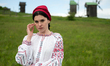 A woman wears a vyshyvanka (Ukrainian embroidered shirt) of the Luhansk region at the Nati...