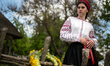 A woman wears a vyshyvanka (Ukrainian embroidered shirt) of the Luhansk region at the Nati...