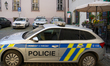 Police patrol vehicles park in front of a local police station in the historic center of P...