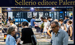 People visit the stand of the editorial group Sellerio from Palermo at the Salone del Libr...