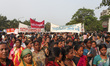 A garment worker takes part in a rally against the surge in gender-based violence and dema...