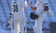 Mohammad Abbas congratulates Nottinghamshire teammate Haseeb Hameed after he reaches 200 d...
