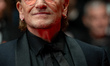 Bono attends the ''Bono: Stories Of Surrender'' red carpet at the 78th annual Cannes Film...