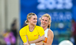 Katie Moon (left) and Emily Grove (right) of the United States react during the Women's Po...