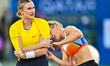 Katie Moon (left) and Emily Grove (right) of the United States react during the Women's Po...