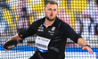 Henrik Janssen of Germany competes in the men's Discus Throw final at the Diamond League D...