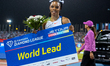 Tia Clayton of Jamaica celebrates after winning the women's 100m final at the Diamond Leag...
