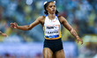 (From left to right) Kambundji Mujinga of Switzerland competes in the women's 100m final a...