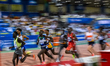Athletes compete in the men's 5000m final at the Diamond League Doha Meeting 2025 competit...