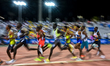 Athletes compete in the men's 5000m final at the Diamond League Doha Meeting 2025 competit...
