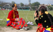 Members of Nepal's indigenous Kirat community pose for a photo as they gather to celebrate...