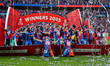 Players celebrate with the FA Cup during the Emirates FA Cup Final between Crystal Palace...