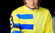 Jockey Sofia Vives rides out of the paddock ahead of the first race at Woodbine Racetrack...