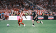 OFI's Thanasis Androutsos (right) is challenged by Olympiacos' Chiquinho (left) during the...