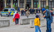 German police officers equipped with protective gear stand in front of Augsburg Central St...