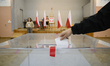 A man casts his ballot at a polling station during presidential elections in Warsaw, Polan...