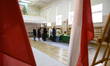 People queue to receive their ballots at a polling station during presidential elections i...